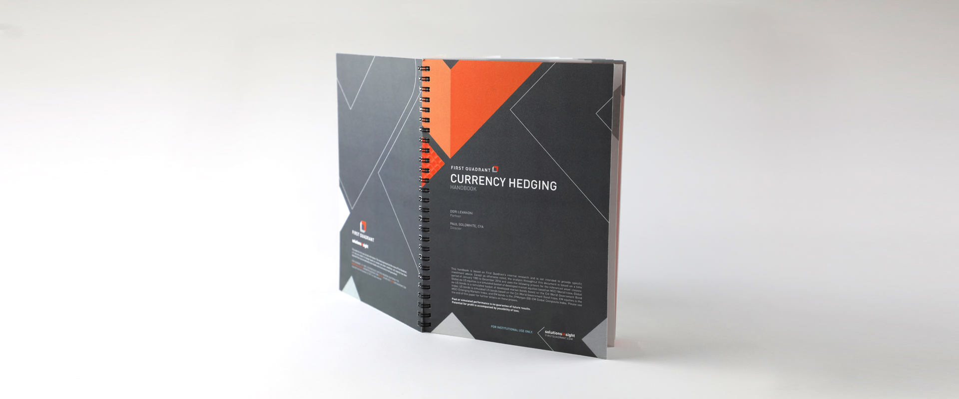 Vertical front and back cover view of the handbook.